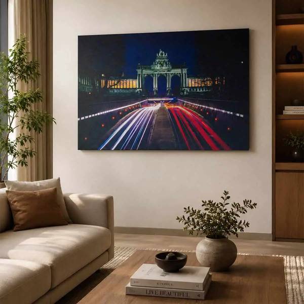 Framed Brussels light painting above a sofa in a bright living room