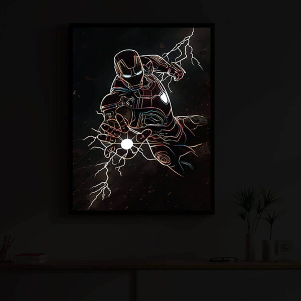 Iron Man illuminated at night