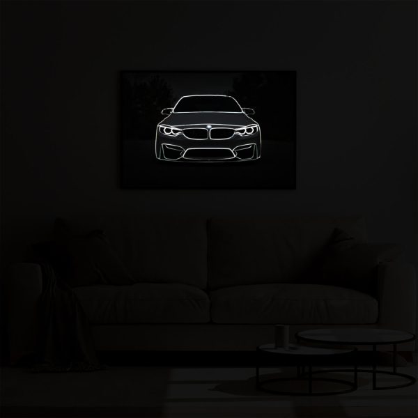 BMW M3 illuminated at night