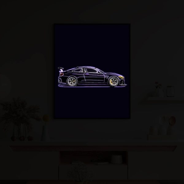 Purple BMW M4 illuminated at night