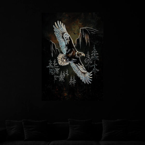 Eagle illuminated at night