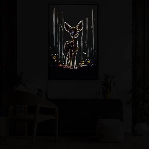 Oh Deer! illuminated at night