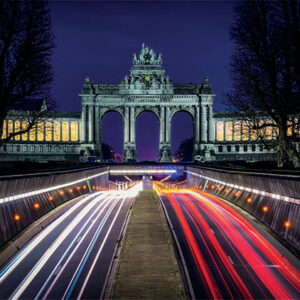 Brussels LED light canvas wall art glowing at night, featuring the Cinquantenaire arch with light trails