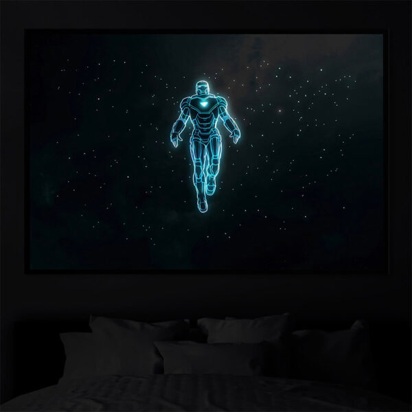 Iron Man illuminated at night
